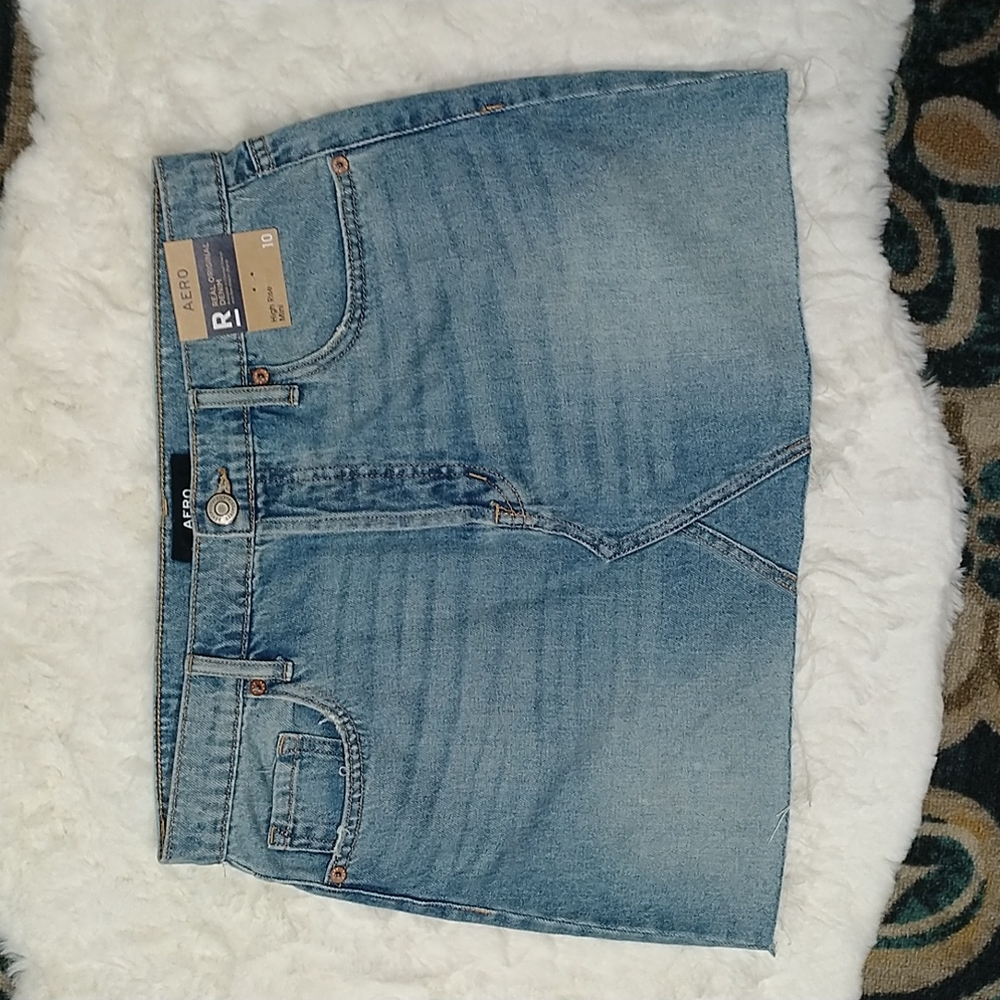 New Aero high rise mini light wash button fly jean skirt sz 10